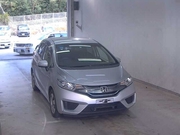 Хэтчбек гибрид Honda Fit кузов GP5 модификация BaseGrade гв 2014